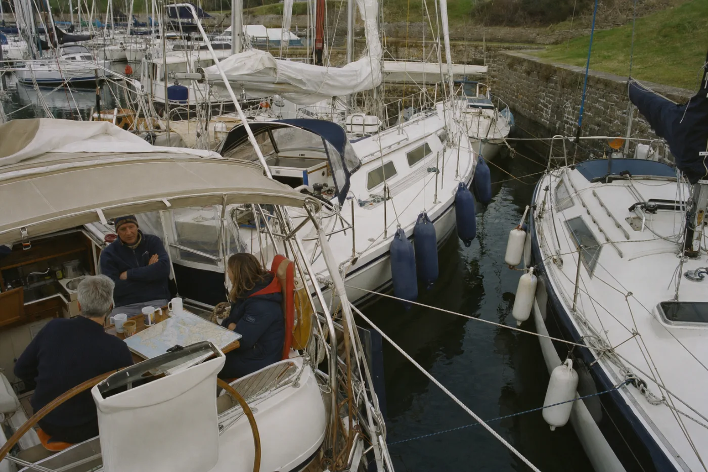 Boats rafted together in a quiet anchorage